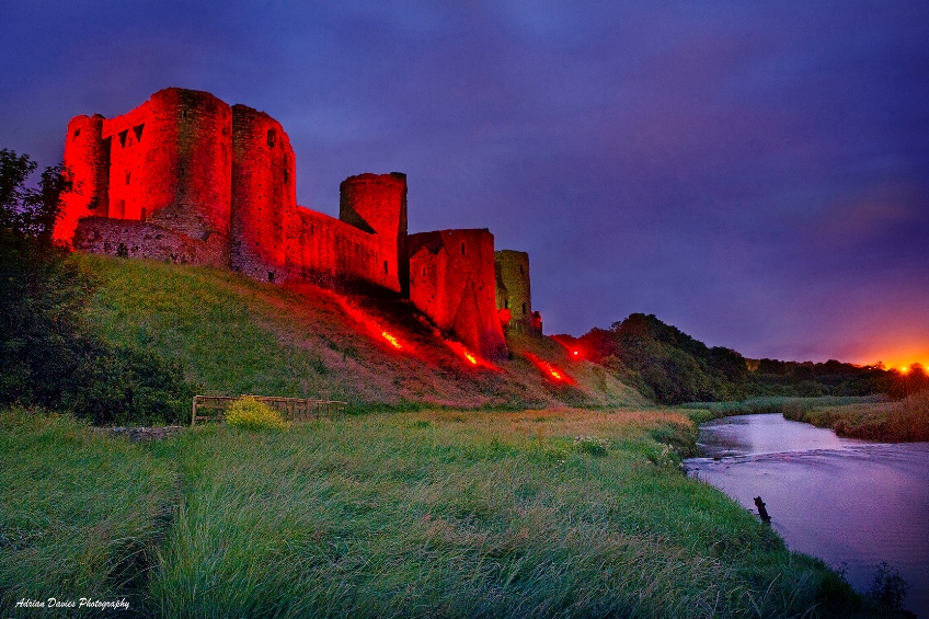 Cydweli Castle lit up in red to celebrate Wales' Euro 2016 sucess  